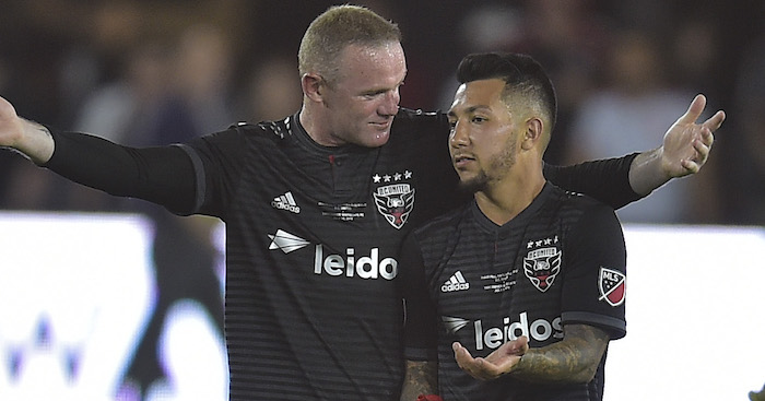 Wayne Rooney (L) of DC United celebrates with Luciano Acosta