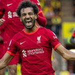Mohamed Salah celebrates Liverpool's third goal at Norwich Mohamed Salah celebrates after scoring the third goal during the 2021-2022 season English Premier League first round match between Norwich City and Liverpool