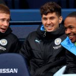 Kevin de Bruyne, John Stones, Raheem Sterling sat on Manchester City bench Manchester City's Kevin De Bruyne (left) John Stones (centre) and Raheem Sterling before the FA Cup fourth round match at the Etihad Stadium