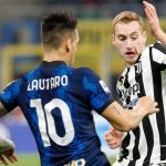 Lautaro Martinez trying to tackle Dejan Kulusevski Lautaro Martinez challenging Dejan Kulusevski