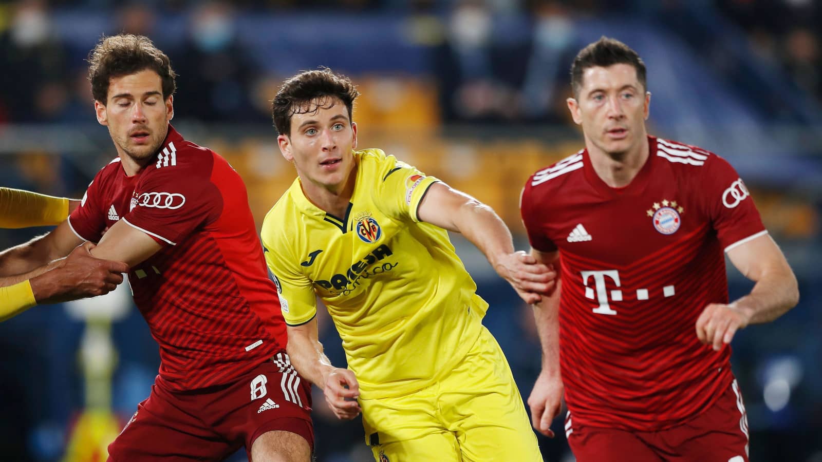 Villarreal defender Pau Torres flanked by Bayern Munich pair Leon Goretzka and Robert Lewandowski